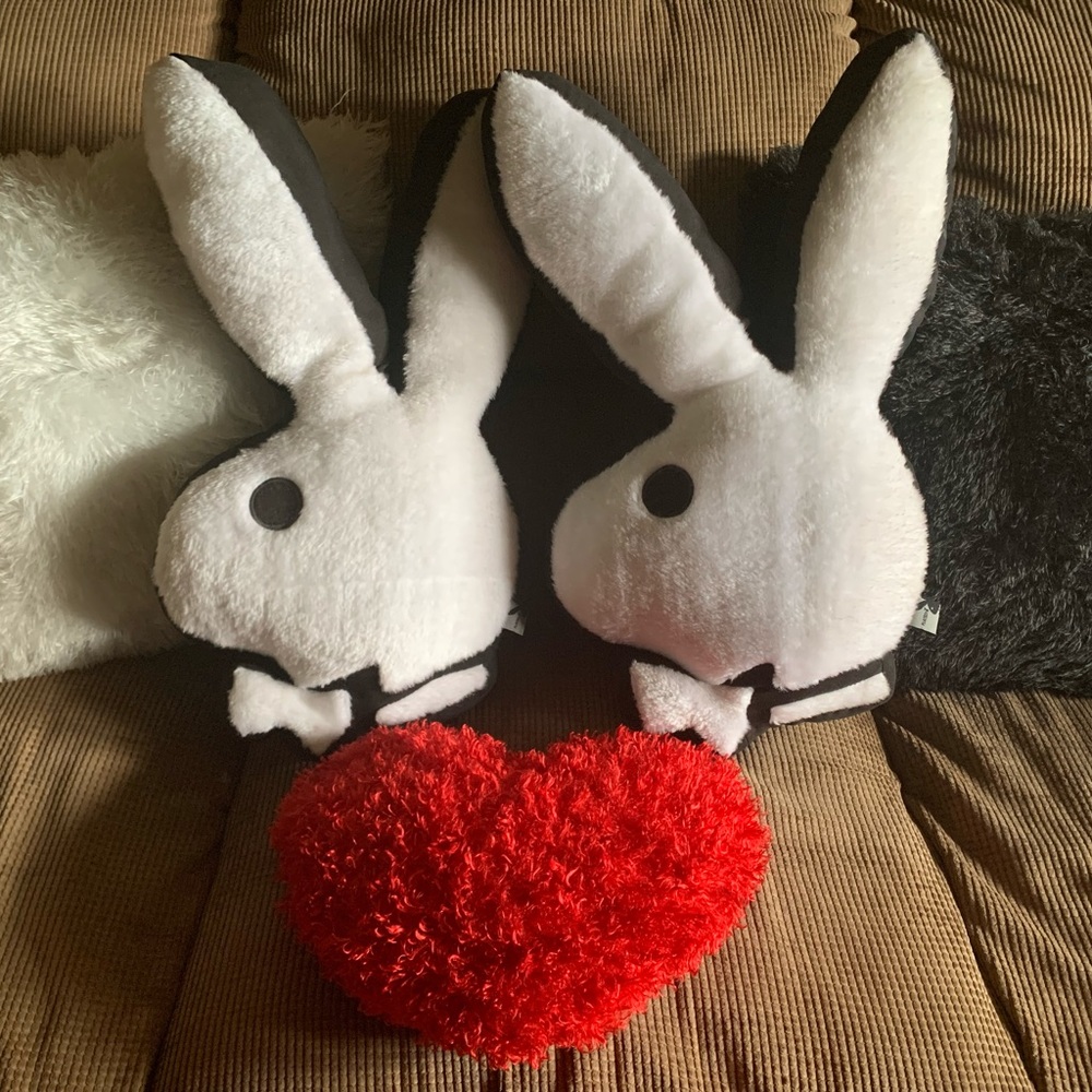 Playboy bunny pillows and 3 fluffy extra pillows (not playboy)